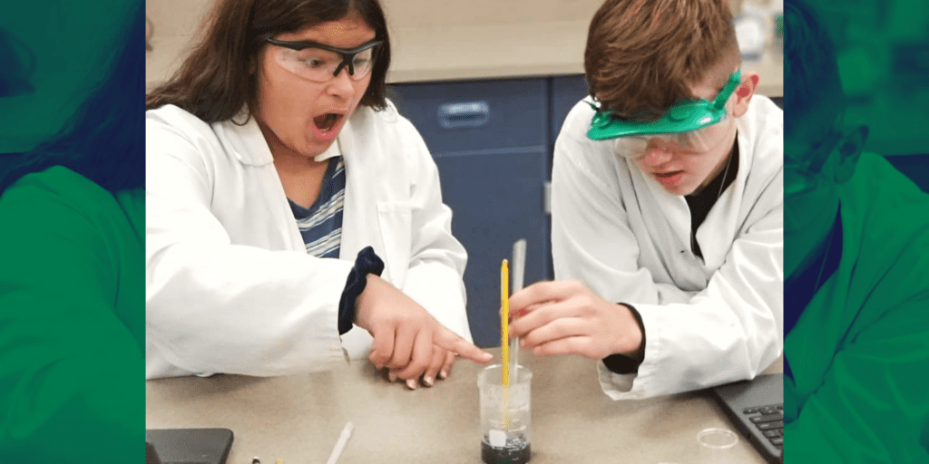 [PHOTO: 8th grade students at Big Hollow Middle School make meaningful observations while reacting a copper chloride solution and aluminum foil using the IQWST curriculum and science kit! Credit: @mshagenscience (Twitter)