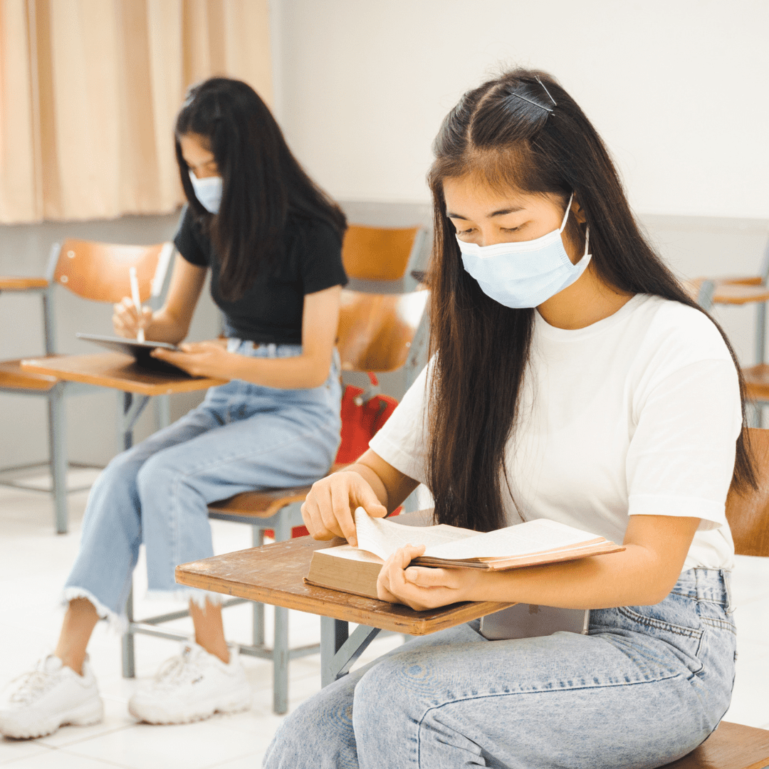 Students wearing face masks in the classroom during the COVID-19 virus outbreak