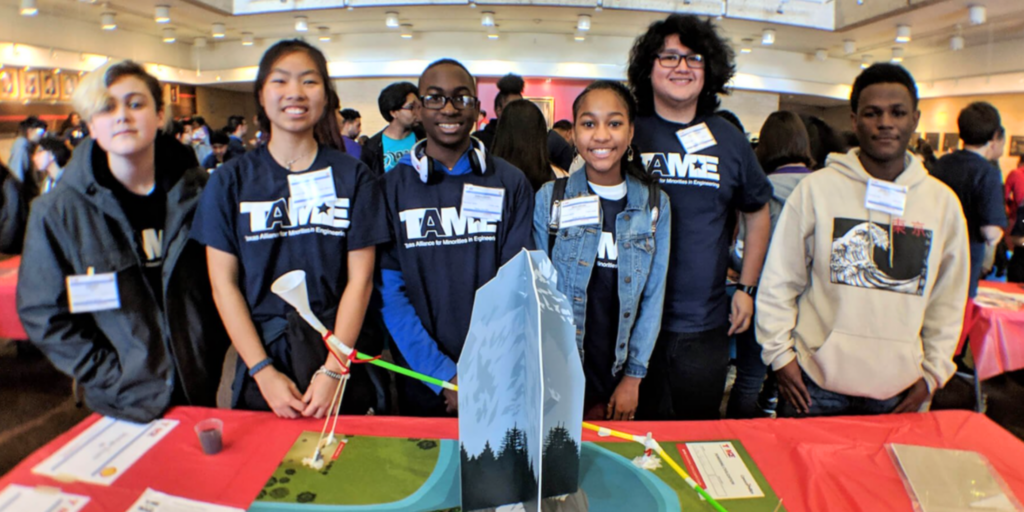 Middle school students competing in an engineering competition